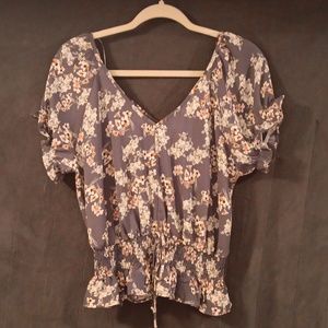 Purple flowered blouse